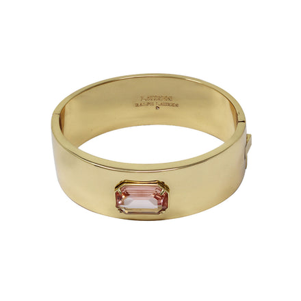 BRAZALETE MARCA RALPH LAUREN DORADO DE SILUETA BRAZALETE DETALLE DE CRISTAL ROSA