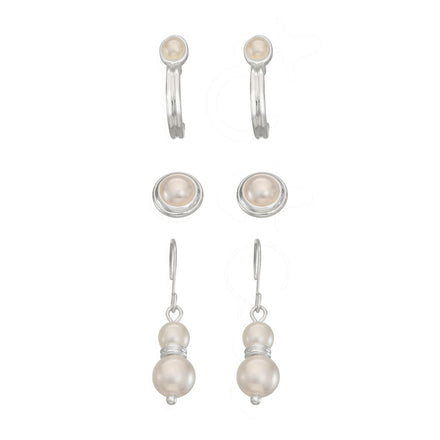 ARETES color PLATA marca Napier tipo botón en set de tres con incrustaciones tipo perla en diferentes formas