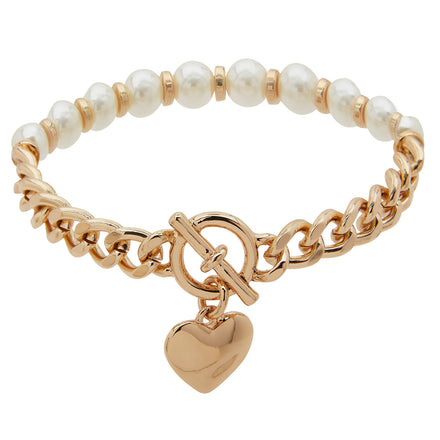 Pulsera Pearl para dama color Dorado marca Nine West tipo charm en forma de corazón e incrustaciones de imitación madre perla